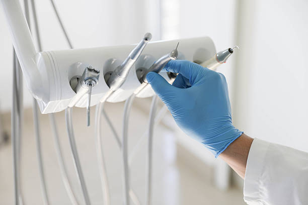 Professional Tooth Extraction technician working in Marietta, OK